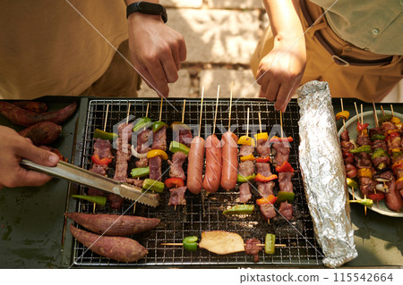 Cooking Meat on Grill 115542664