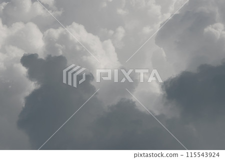 white thunderclouds in blue sky. summer cumulus clouds before rain. Beautiful view of nature 115543924