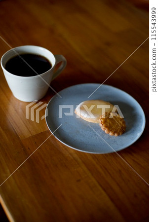 Coffee time with lemon cookies and sables as a snack Coffee time with lemon cookies and sables as a snack 115543999
