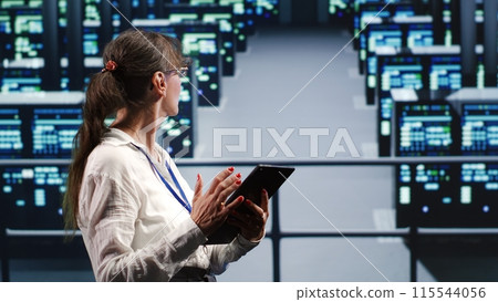 Adept supervisor in high tech location equipped to handle modern computing requirements, doing regular upgrades to server cabinets, increasing processing power and storage capacity to prevent glitches Adept supervisor in high tech location equipped to handle modern computing requirements, doing regular upgrades to server cabinets, increasing processing power and storage capacity to prevent glitches 115544056