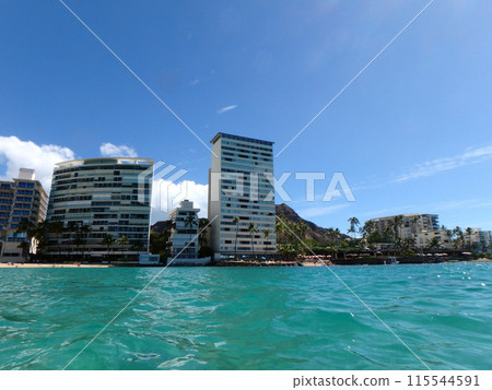 Blue waters of Waikiki with Hotels and Diamond Head in view 115544591