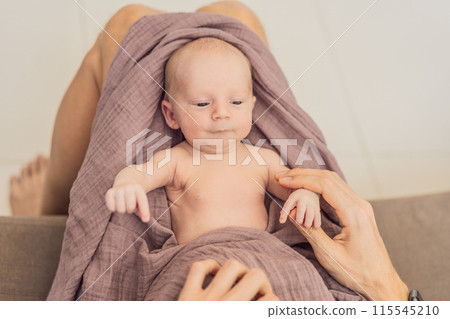 Dad and newborn at home. This tender moment captures the bond between father and child in a loving and comfortable family environment highlighting the joys of parenthood and the warmth of home Dad and newborn at home. This tender moment captures the bond between father and child in a loving and comfortable family environment highlighting the joys of parenthood and the warmth of home 115545210