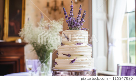 Wedding cake with lavender flowers. Festive table decoration. 115547080