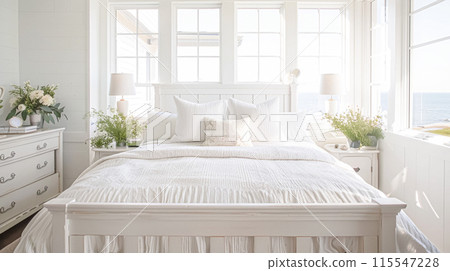 Beautiful interior of luxury bedroom with window sea view. Coastal cottage concept. High quality photo Beautiful interior of luxury bedroom with window sea view. Coastal cottage concept. High quality photo 115547228