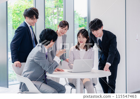 Smiling business people having a meeting in the office Smiling business people having a meeting in the office 115547463