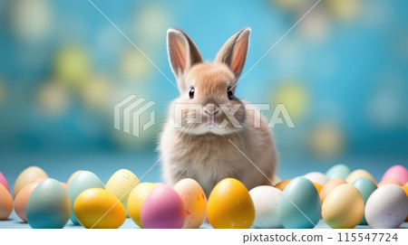 Cute rabbit with colorful Easter eggs on blue background 115547724