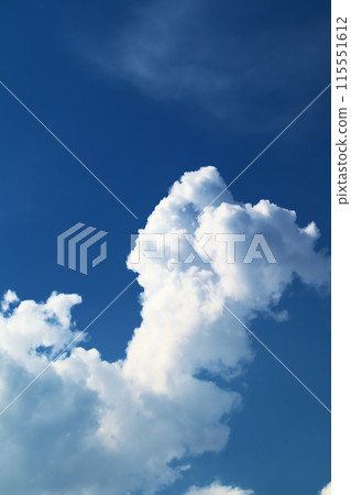 A cumulonimbus cloud has appeared in the blue sky and is growing large and ominously. A cumulonimbus cloud has appeared in the blue sky and is growing large and ominously. 115551612