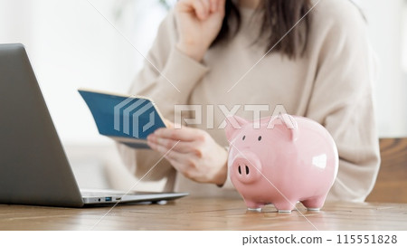 A woman worried about her bankbook balance A woman worried about her bankbook balance 115551828