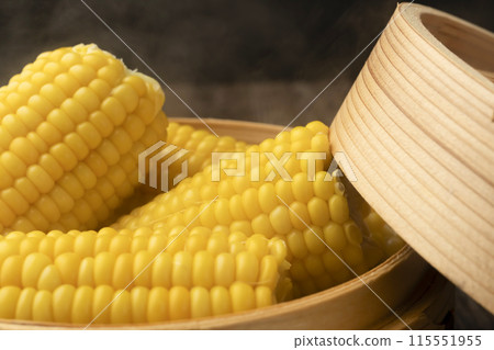 Steaming corn in a bamboo steamer Freshly steamed Steaming corn in a bamboo steamer Freshly steamed 115551955