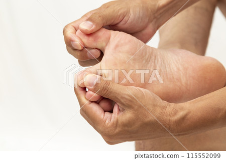 Men's feet on white background 115552099