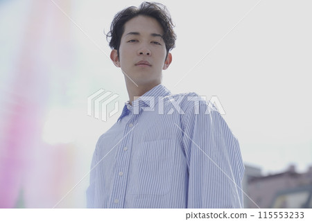 Male portrait under blue sky Male portrait under blue sky 115553233