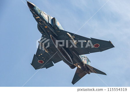 RF-4 fighter jets flying in the sky 115554319