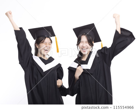 Happy and success girl friend graduates in cap and gown Happy and success girl friend graduates in cap and gown 115554966