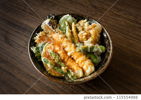 Bowl of rice and fried fish 115554998