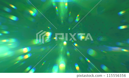 Abstract green glowing background with flying balls and circles of blurred festive bokeh particles Abstract green glowing background with flying balls and circles of blurred festive bokeh particles 115556356