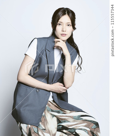 Stylish woman on white background 115557344