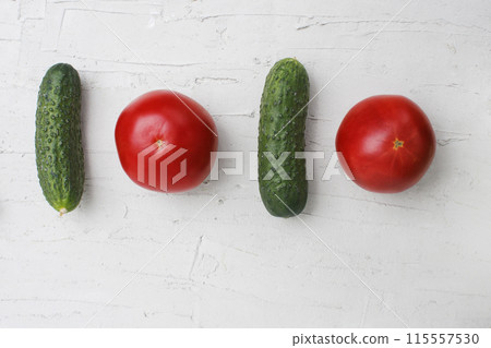 Flat lay of tomatoes and cucumbers. Flat lay of tomatoes and cucumbers. 115557530