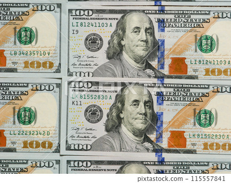 Background of 100 dollar bills, top view. 115557841