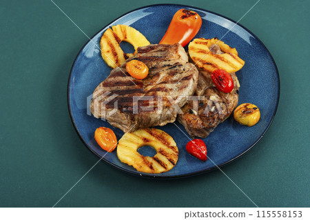Grilled meat steak with pineapple. Grilled meat steak with pineapple. 115558153