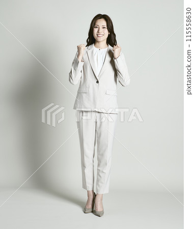 A woman wearing a suit on a white background 115558630