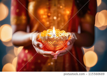 Diwali Diyas: Indian Girl Embracing the Festival of Lights - Generative AI 115560689