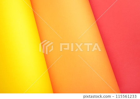 Color papers flat composition background with yellow, orange and red color 115561233