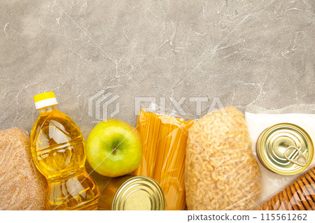 Food donations for people. Donation food on the grey background. Top view. 115561262