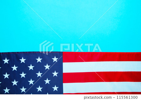 American flag on blue background with copy space American flag on blue background with copy space 115561300