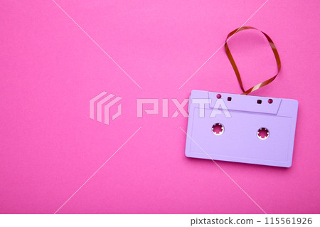 One purple cassette on a pink background. Music day 115561926
