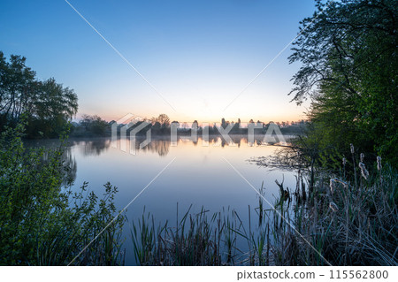 Thuerer meadows close to Mendig during sunrise, Eifel, Rhineland-Palatinate, Germany Thuerer meadows close to Mendig during sunrise, Eifel, Rhineland-Palatinate, Germany 115562800