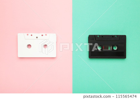 Two old colorful cassettes on a colorful background. Music day Two old colorful cassettes on a colorful background. Music day 115565474