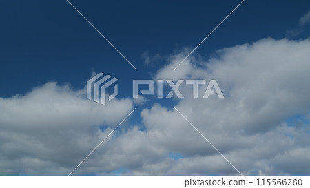 Changing stratocumulus cloudscape. Clouds in blue sky slowly move and change shape. Timelapse. Changing stratocumulus cloudscape. Clouds in blue sky slowly move and change shape. Timelapse. 115566280