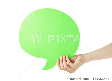 Hand holding an green empty speech bubble isolated on white background 115566567