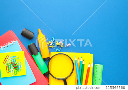 School supplies on blue background. Back to school. Flat lay. 115566568