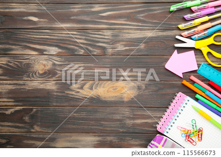 Back to school concept on brown wooden background. Top view Back to school concept on brown wooden background. Top view 115566673