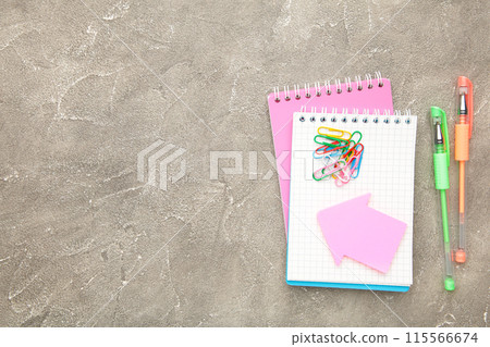 Back to school concept on grey concrete background. Top view Back to school concept on grey concrete background. Top view 115566674
