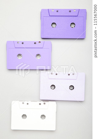 Old colorful cassettes on a grey background. Music day Old colorful cassettes on a grey background. Music day 115567000