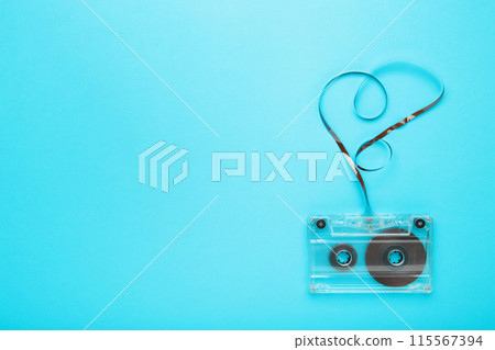 One old cassette on a blue background. Music day 115567394