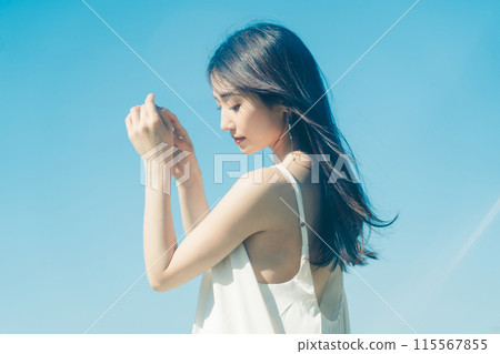 Image of young woman's UV care Image of young woman's UV care 115567855