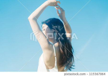 Image of young woman's UV care 115567864