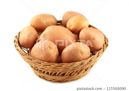 Basket of fresh tasty new potatoes isolated on white background Basket of fresh tasty new potatoes isolated on white background 115568090