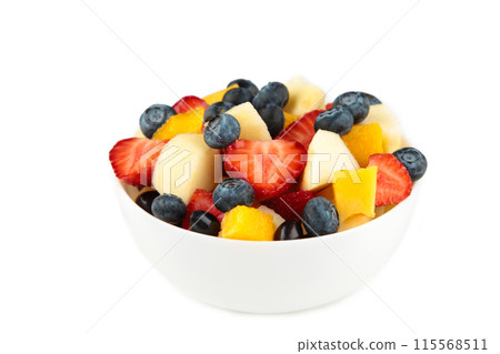 Fresh fruit salad in white bowl isolated on white background Fresh fruit salad in white bowl isolated on white background 115568511