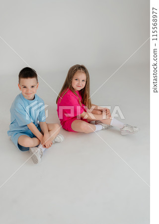 Full length body size view of attractive cheerful kids dancing moving having fun isolated white background 115568977
