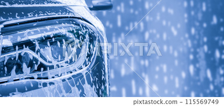 car cleaning and washing with foam soap background 115569749