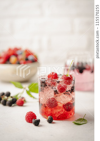 Glass of berry cocktail Glass of berry cocktail 115570255