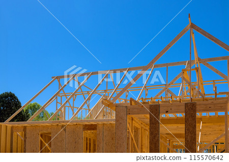 New homes require installation of walls, framework beams, trusses 115570642
