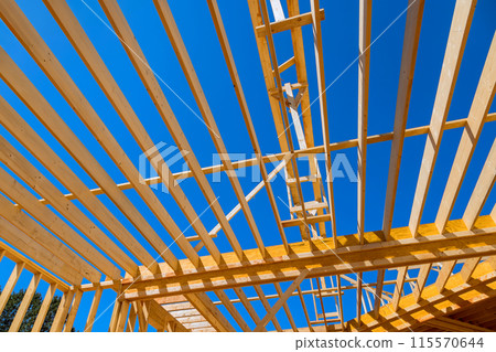 During construction of new home, ceiling rafter framework beams were installed 115570644