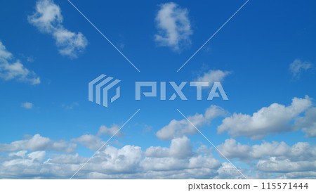 Forming clouds in summer day outdoors. Clouds nature background. Timelapse. Forming clouds in summer day outdoors. Clouds nature background. Timelapse. 115571444