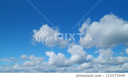 Nature weather blue sky. Clouds with blue light blue sky in horizon. Timelapse. 115571449