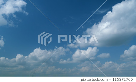Beautiful cirrus and cumulus on different layers cloud formations in a deep blue sky. Soft cirrus couds on blue sky. Timelapse. Beautiful cirrus and cumulus on different layers cloud formations in a deep blue sky. Soft cirrus couds on blue sky. Timelapse. 115571760